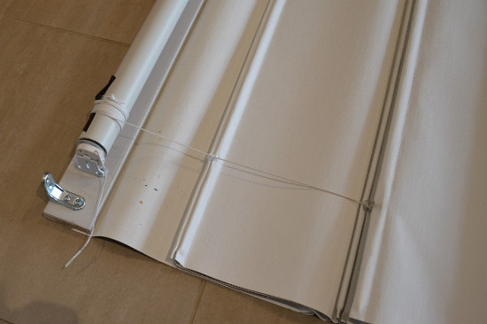 Roman blind cords wrap around motorized tube